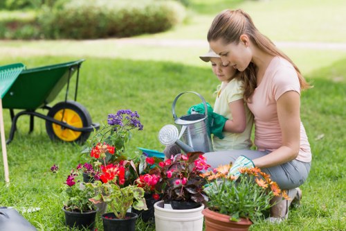 Photograph of a gardener working in a Waterloo garden